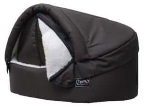 Choozy Oilskin Klam outdoor dog bed in brown oilskin with sherpa lining, showing enclosed clam-shell design with zip-off roof